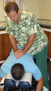 Dr. Ahnen performing chiropractic care on a patien