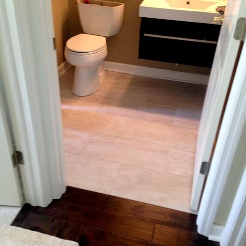 New Hardwood Floor Install and Bathroom Tile Insta