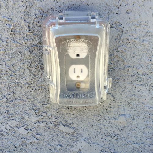New receptacle with outdoor in-use cover.