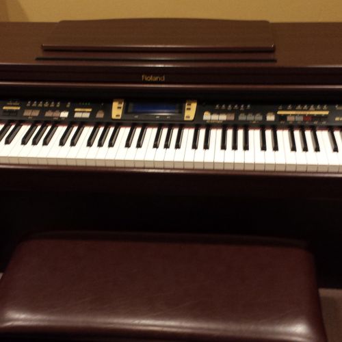 Weighted action piano keyboard for in studio lesso