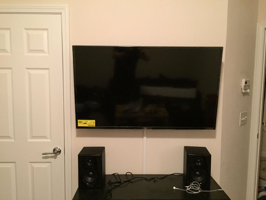 TV mounted and wires concealed with conduit