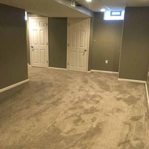 Carpet Installation in Living Room & Basement