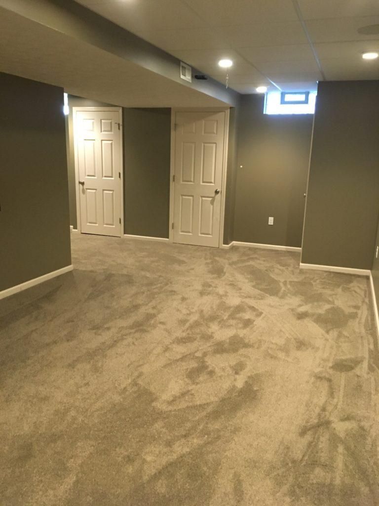 Carpet Installation in Living Room & Basement