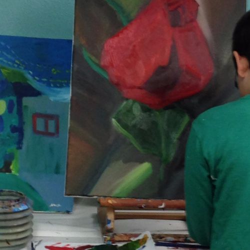 A long-time, 4th grade student working in oils