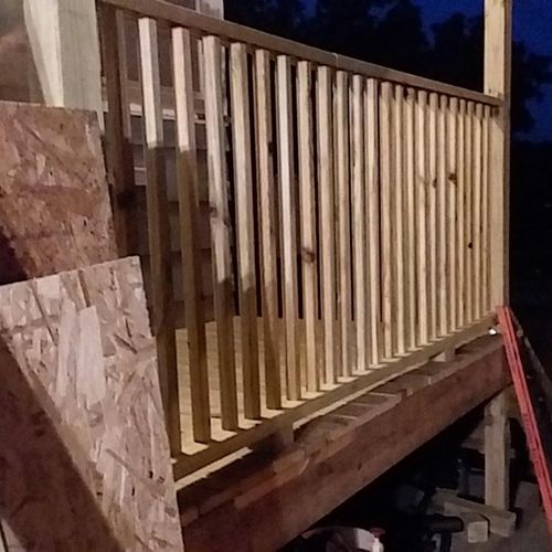 Small deck with handrail built.