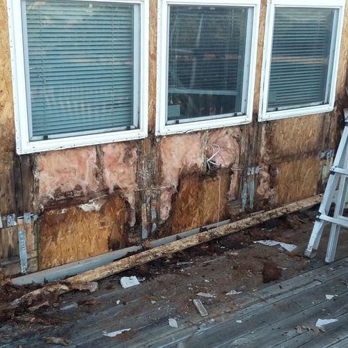 Front living room window rotted out from water lea