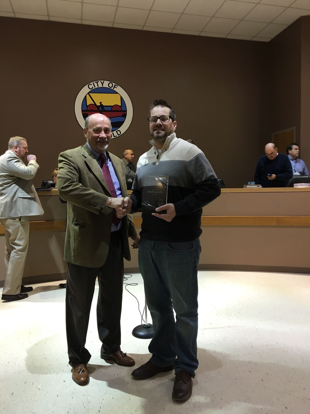 Mike Evans receiving the Mayor's Appreciation Awar