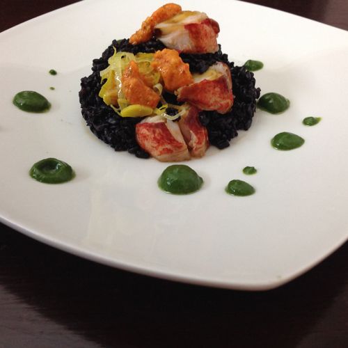 Steamed lobster, black rice, spinach puree, red pe