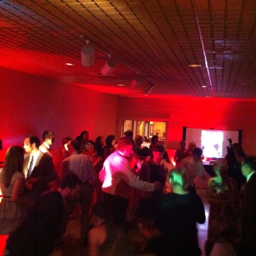 wedding reception with red up lighting