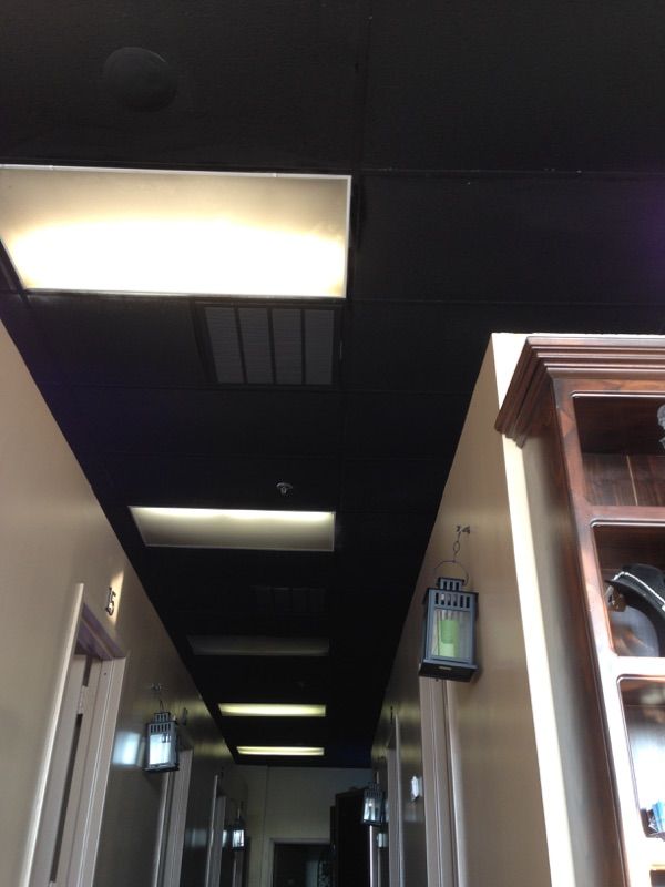 Customer wanted the white drop ceiling painted bla