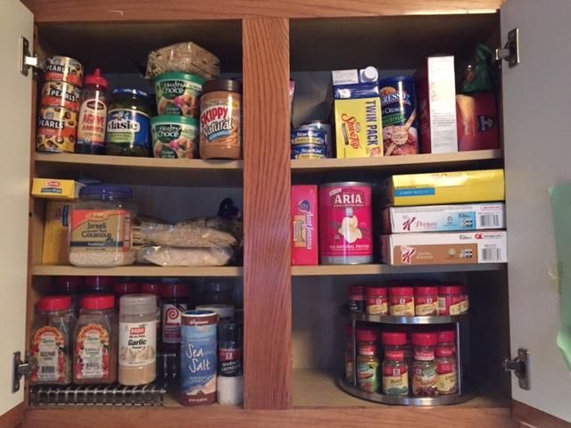 Neatly re-done spices, lazy susan trays help so mu