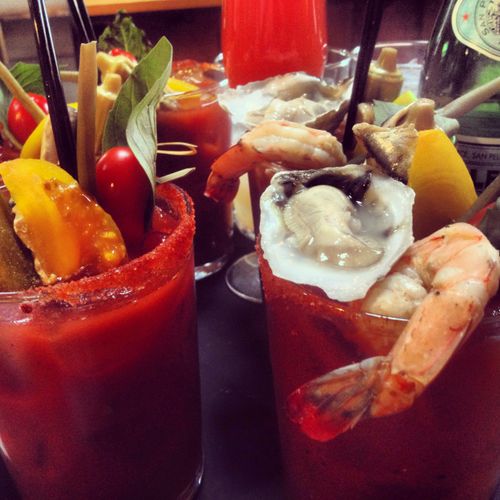 Baller Bloody Mary's garnished with fresh shucked 