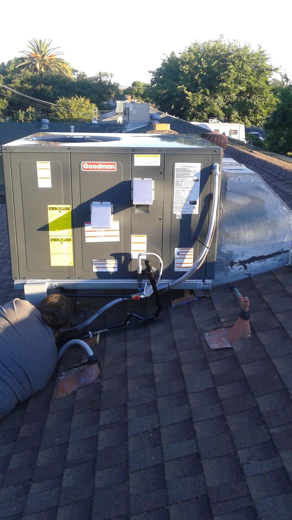 3 ton package unit installation on top of a home.