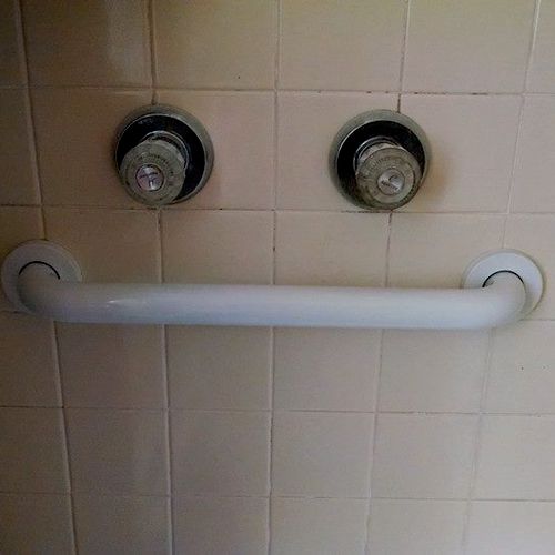 Grab bars installed in shower. To insure safe and 