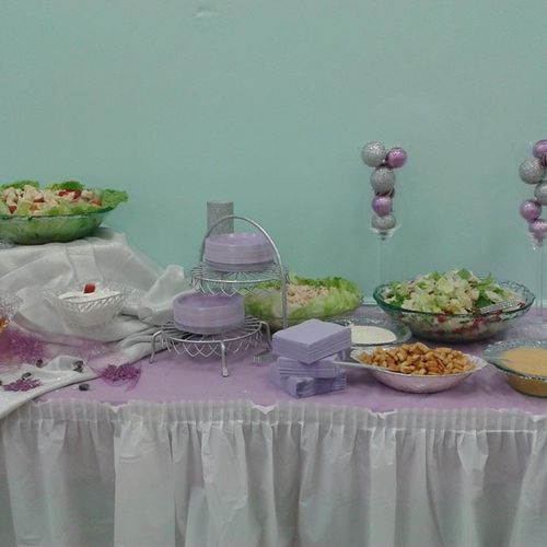 Birthday Party: An appetizer table filled with a g
