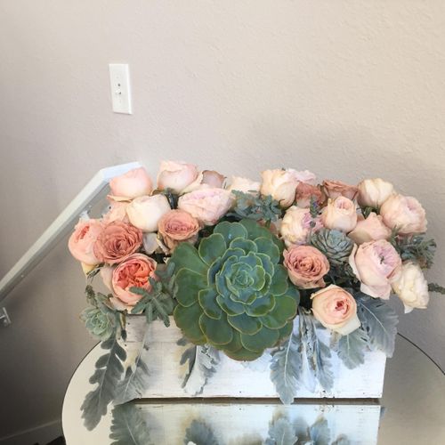 Garden roses and succulent centerpieces for Barret