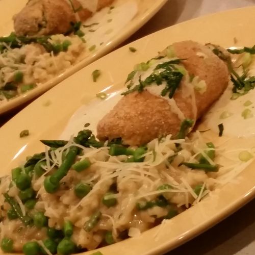 Spring risotto with chicken breast stuffed with ri