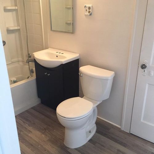 Installed new toilet, sink, vanity. Painted the ro