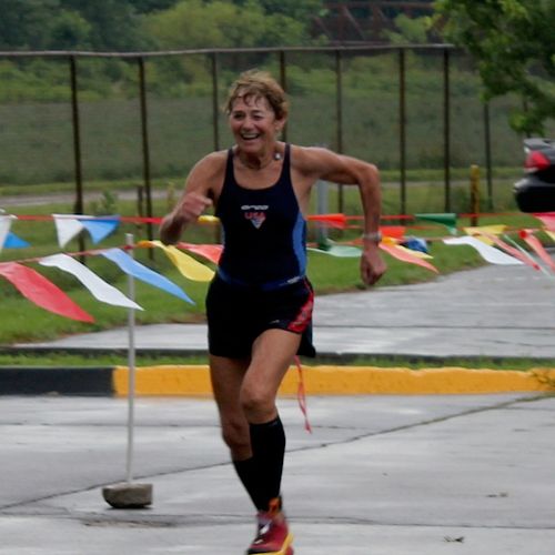 My 72 y/o client finishing her sprint triathlon