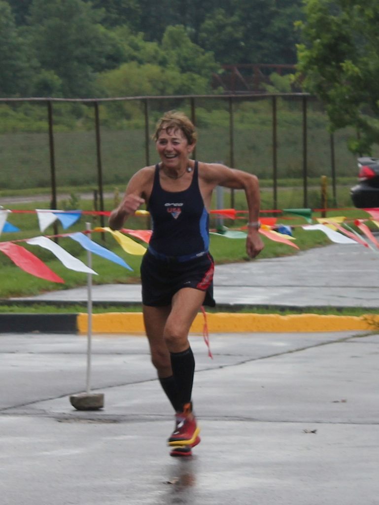 My 72 y/o client finishing her sprint triathlon