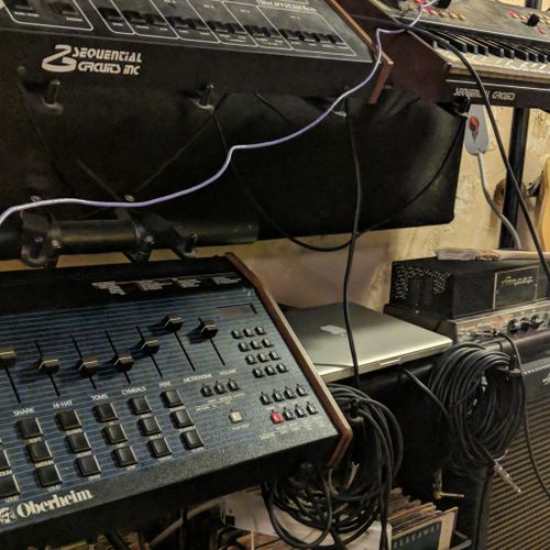 Some vintage drum machines, synthesizers, and amps