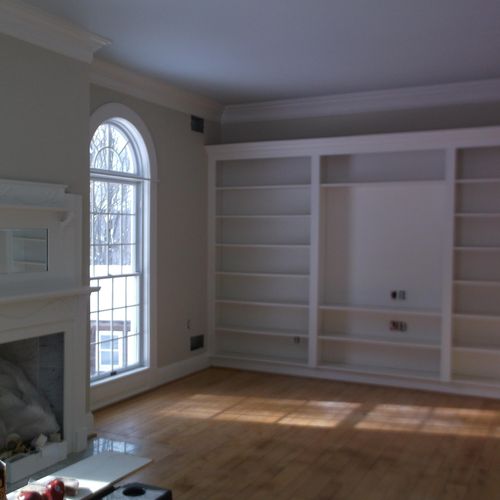 Same room as above: book case painted to match tri