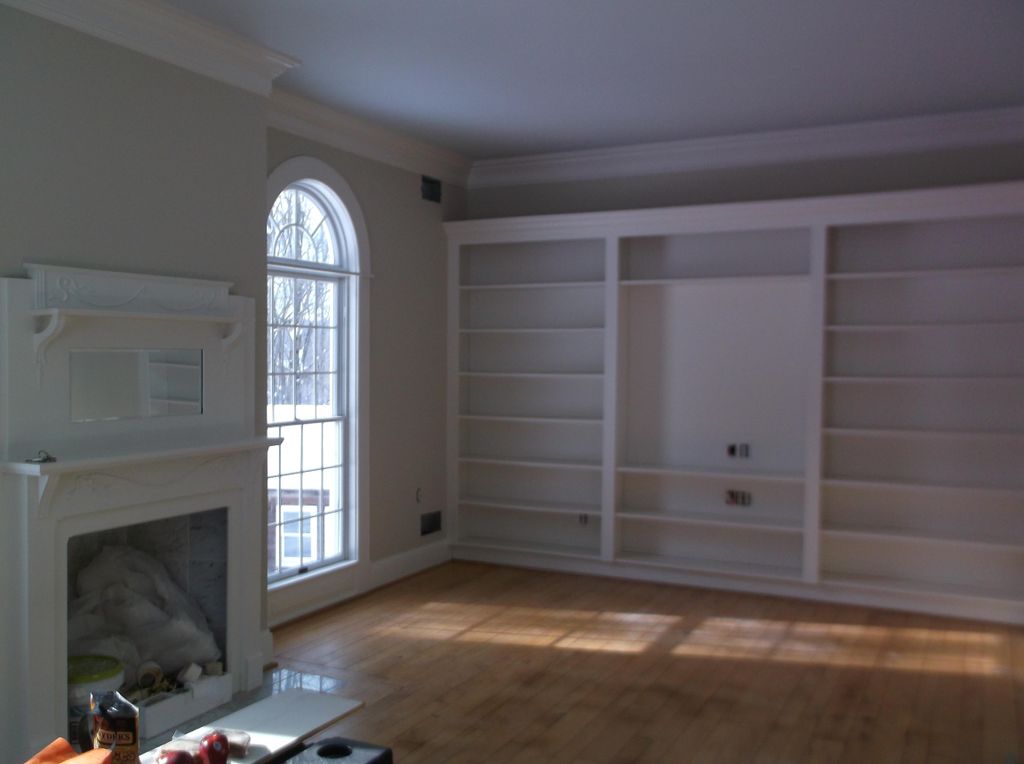 Same room as above: book case painted to match tri