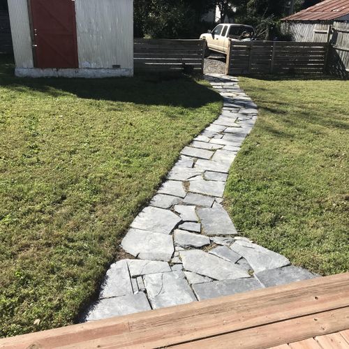 Black slate flagstone pathway install.