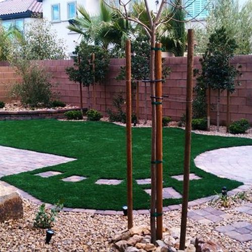 Artificial grass back yard landscape design