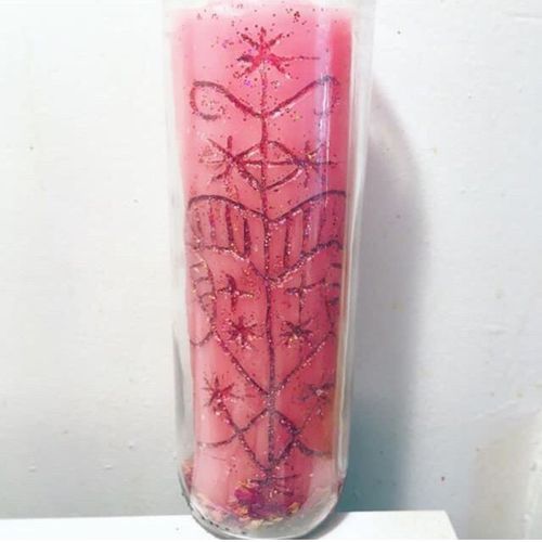 A custom magick voodoo candle for love.