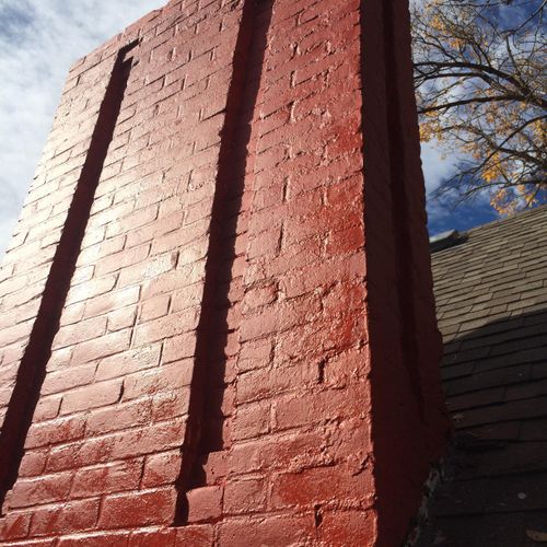 This chimney got tuck pointed and repainted.