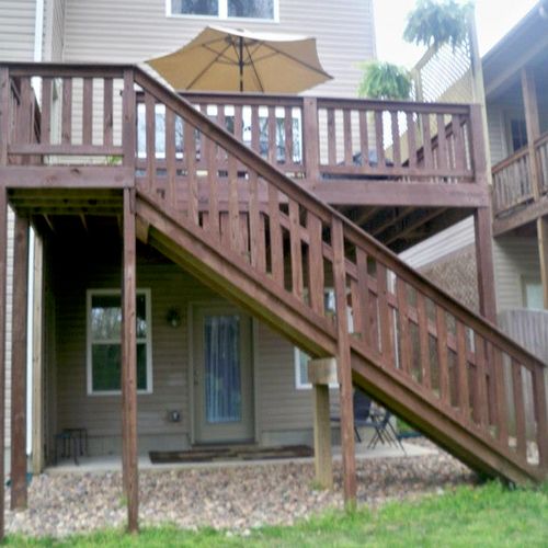 2 STORY DECK WITH 1 X 4 PICKET RAILING.