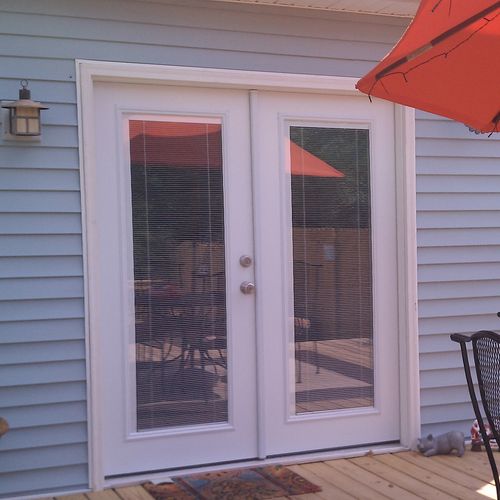 French doors and vinyl siding we installed at the 