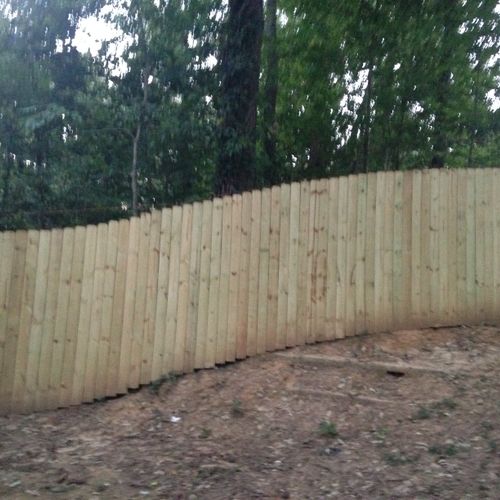 This fence was challenging due to the slope of the