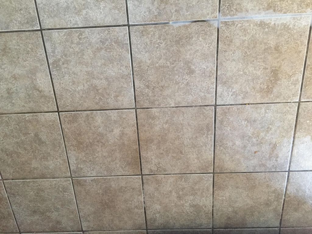 Before:Grout between tile was black