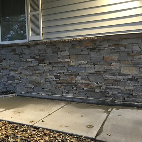 Drystack/stacked stone exterior remodel in Golden,
