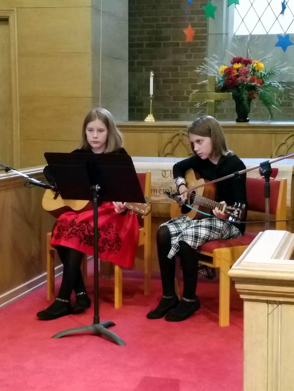 Playing a duet at the recital.