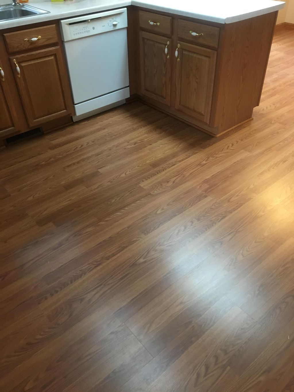 Replaced kitchen and dinning area floor with lamin