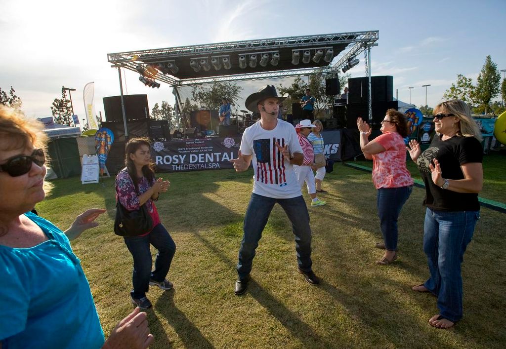 Working the crowd at Fountain Valley Summerfest - 