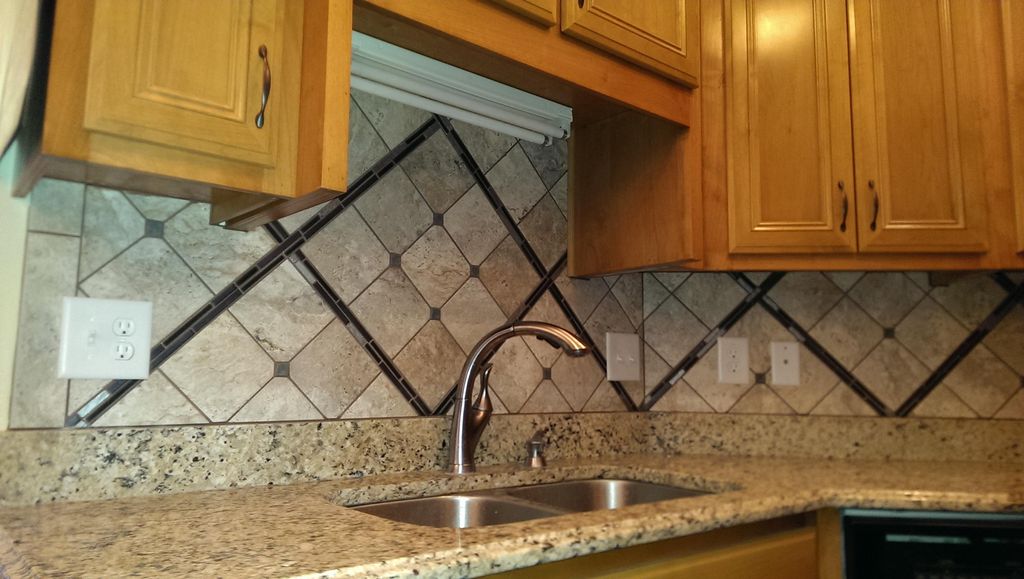 Backsplash custom designed using 3 different types