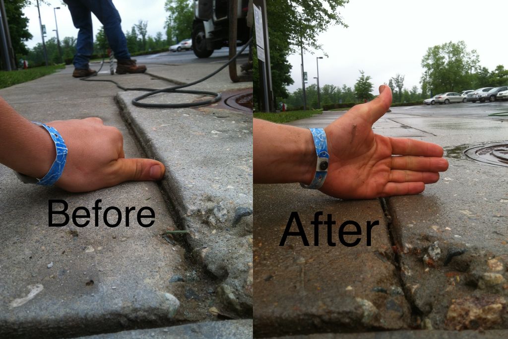 Sidewalk slab settled around drop inlet raised bac