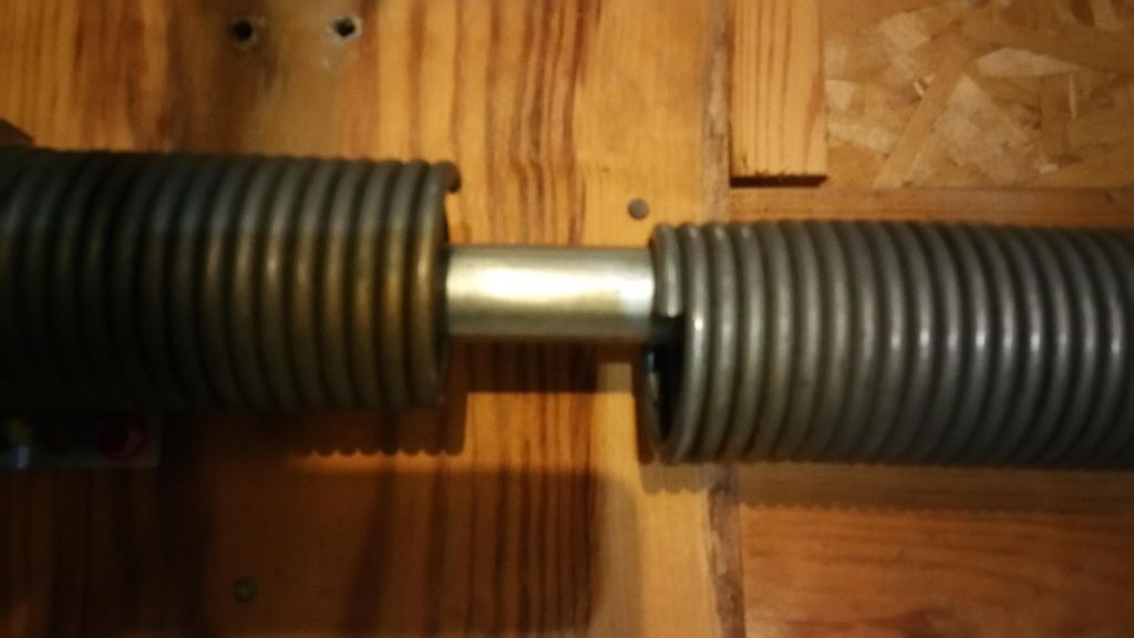 This Is a Broken Torsion Spring . We Have All The 