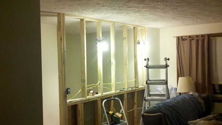 Turning a half-wall into a full wall with sconce l