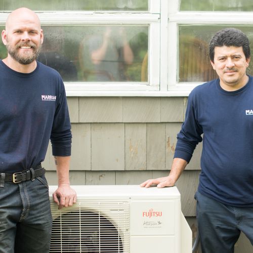 Two of Marran's installers with a Fujitsu ductless