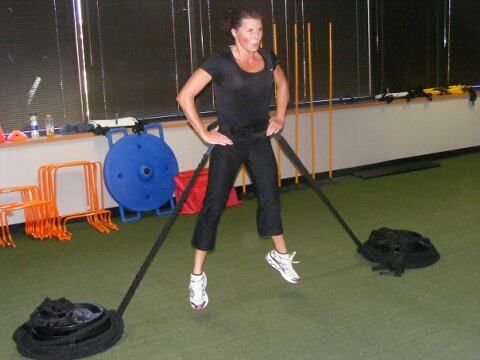 Bungie cord explosive squat jumps.