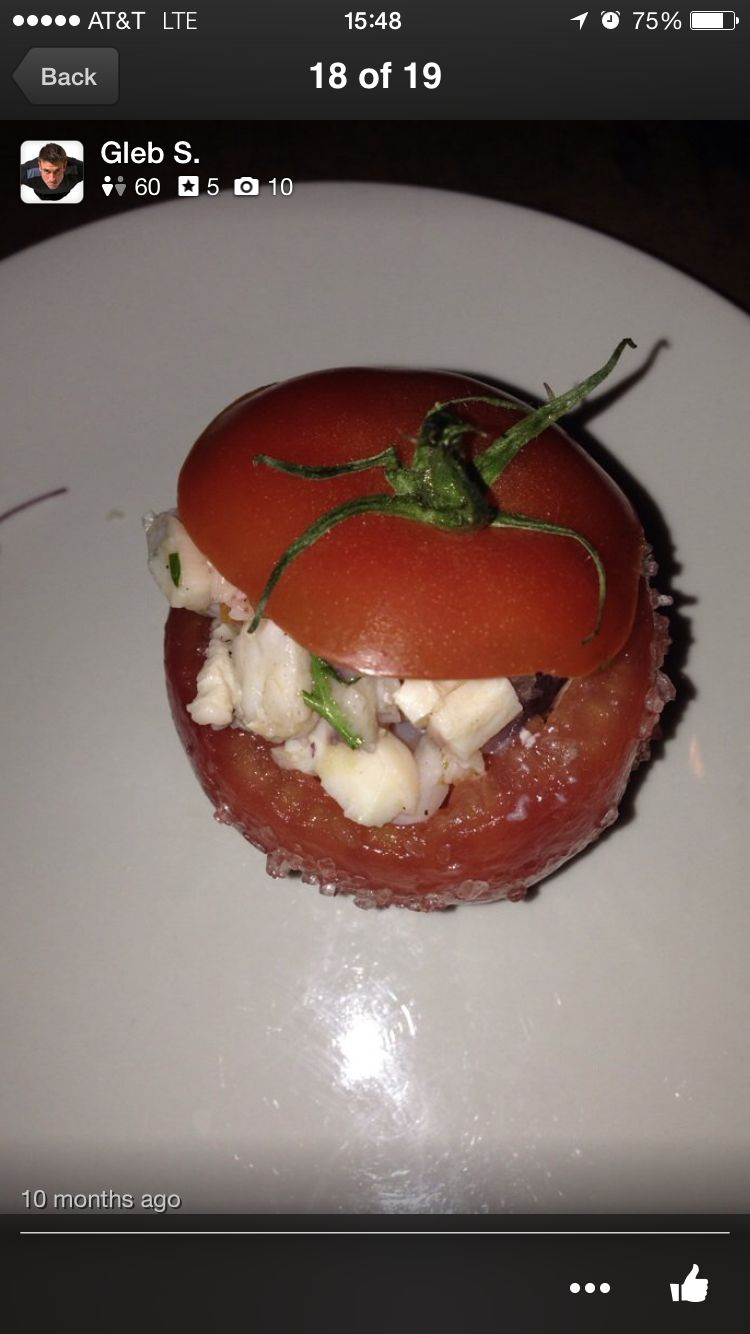 Seafood salad with a vine ripened tomato.