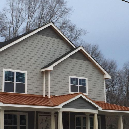 Siding and metal roof porch