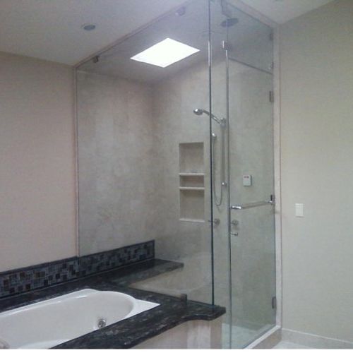 Heavy glass custom steam shower lots of out condit