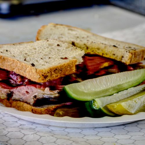 Pastrami on rye with half sour pickles