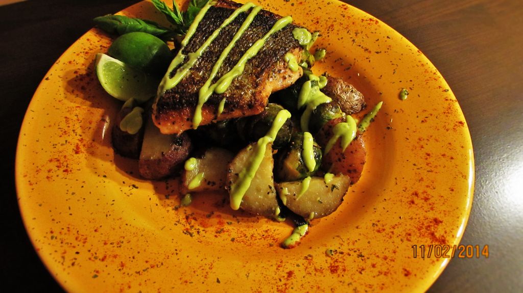 Pan seared salmon, roasted garlic avocado puree, r